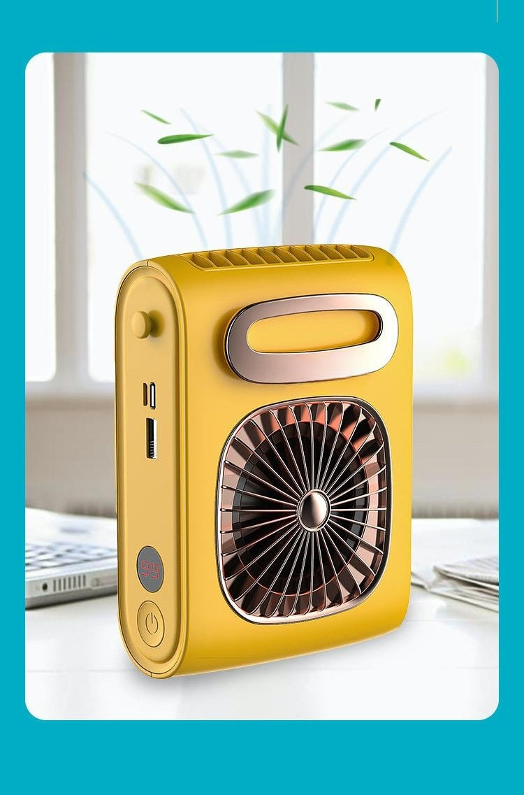 yellow fan on table